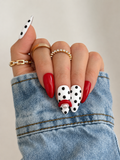 Scarlet Muse luxury handmade gel press-on nails with glossy scarlet red finish.