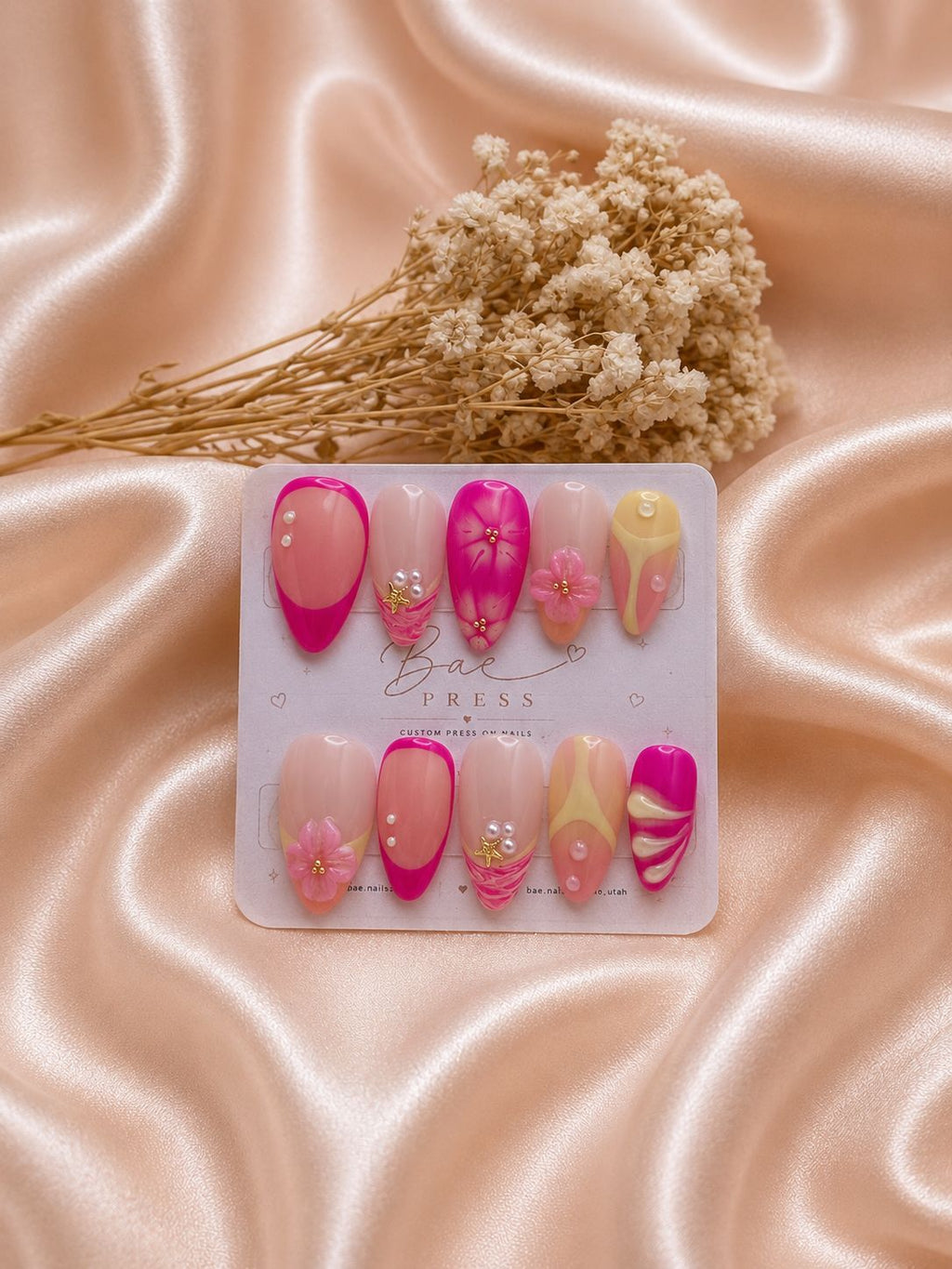 Pink Blossom handmade gel press-on nails with pink floral 3D accents and pearls